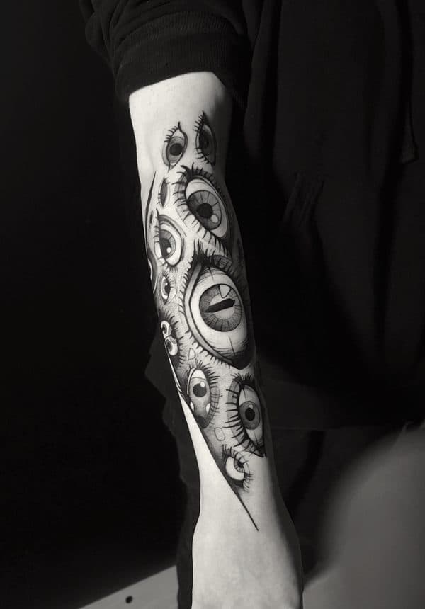 fine line biomechanical eyes down an inner forearm