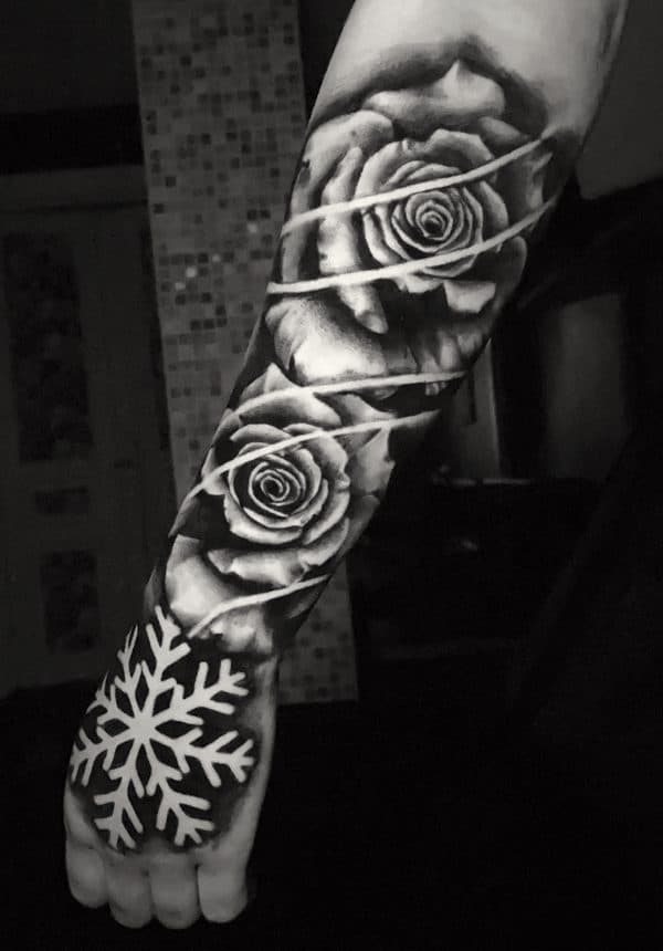 a full sleeve with a compass and map detail